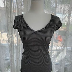 Guess Black and White striped tee with sparkle guess logo.